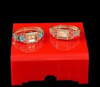 Custom acrylic trade show rings display riser