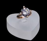 Custom plexiglass heart shaped wedding ring display block
