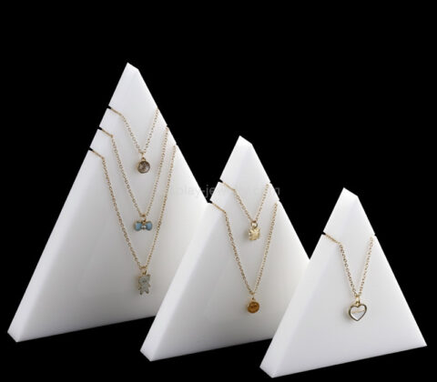 Custom acrylic delta shaped necklaces display blocks
